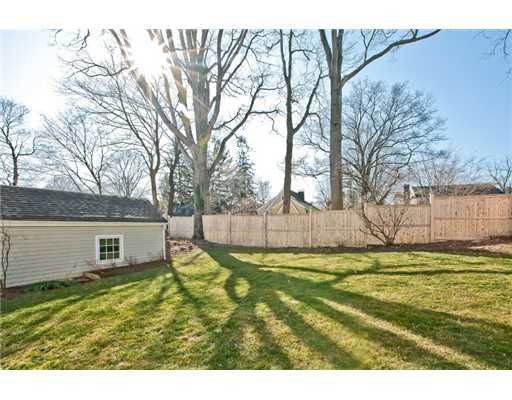 9 Stanley Road Darien, CT 06820 - Photo 17 of 20 a view of a backyard with a large tree