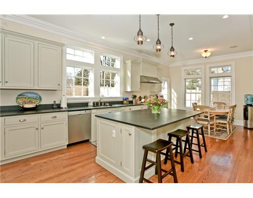 9 Stanley Road Darien, CT 06820 - Photo 6 of 20 a kitchen with stainless steel appliances granite countertop a stove and white cabinets