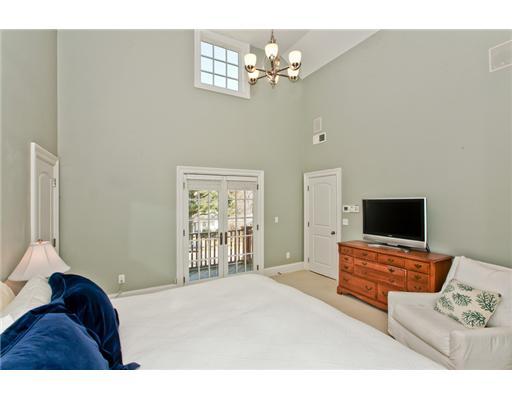 9 Stanley Road Darien, CT 06820 - Photo 10 of 20 a bedroom with furniture and a flat screen tv