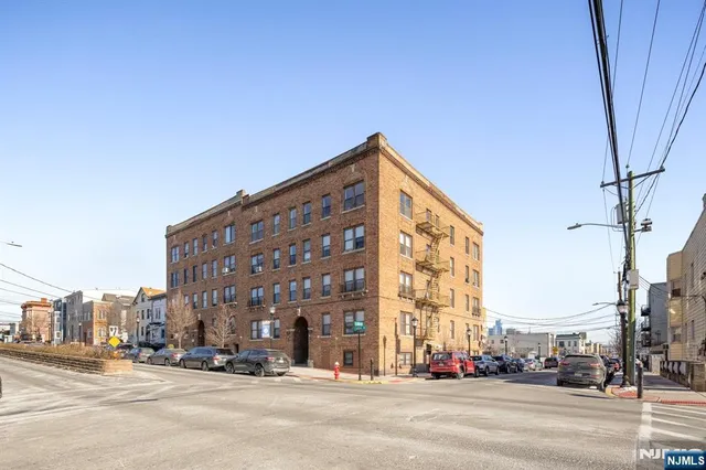 a view of a building and a street