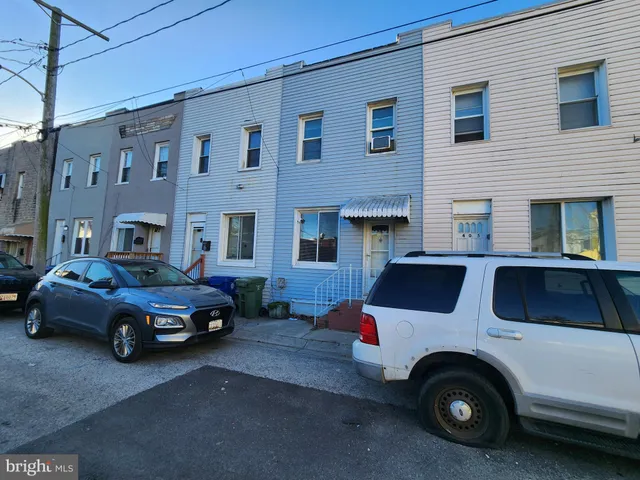 a car parked in front of a building