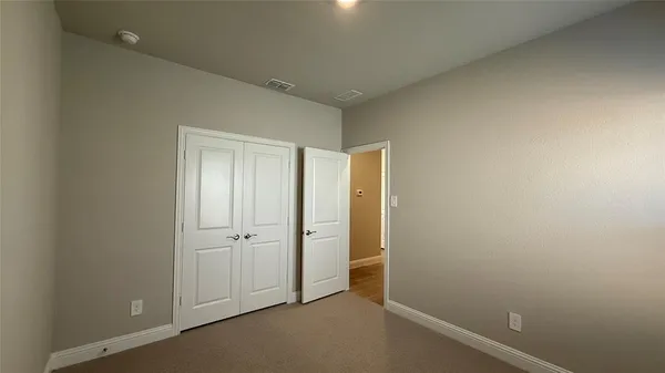 an empty room with an entryway