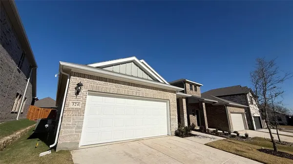 a view of a house with a garage