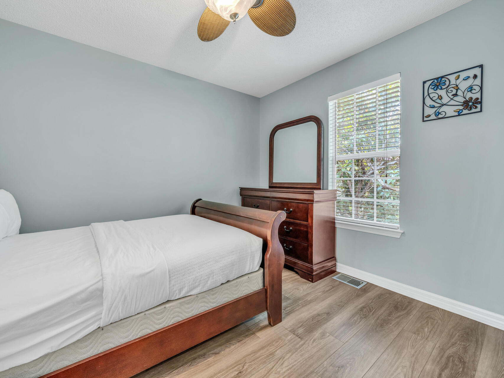 223 Redfish Circle Santa Rosa Beach, FL 32459 - Photo 11 of 26 a bedroom with a bed and a window