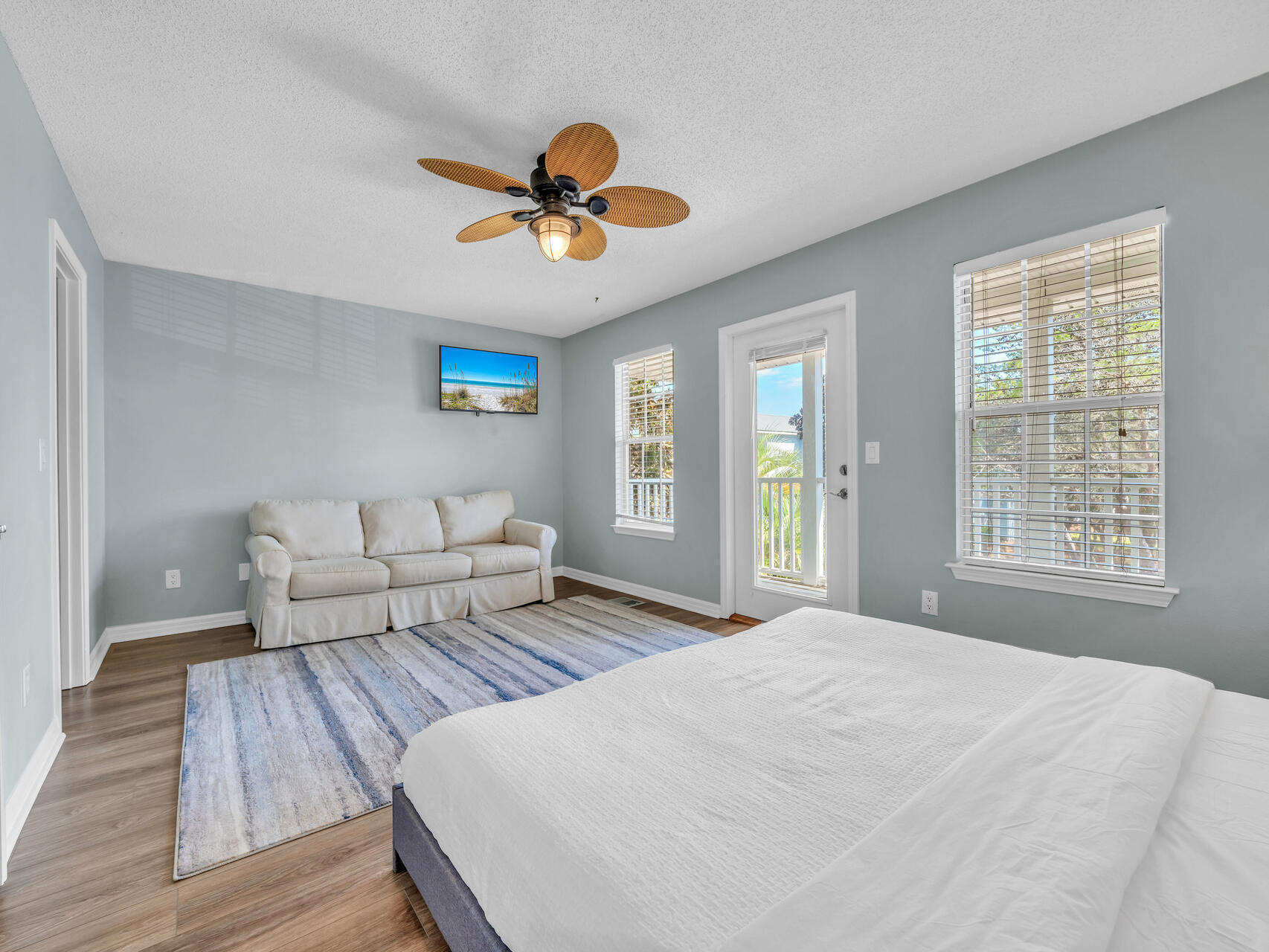 223 Redfish Circle Santa Rosa Beach, FL 32459 - Photo 15 of 26 a bedroom with a bed and a chandelier