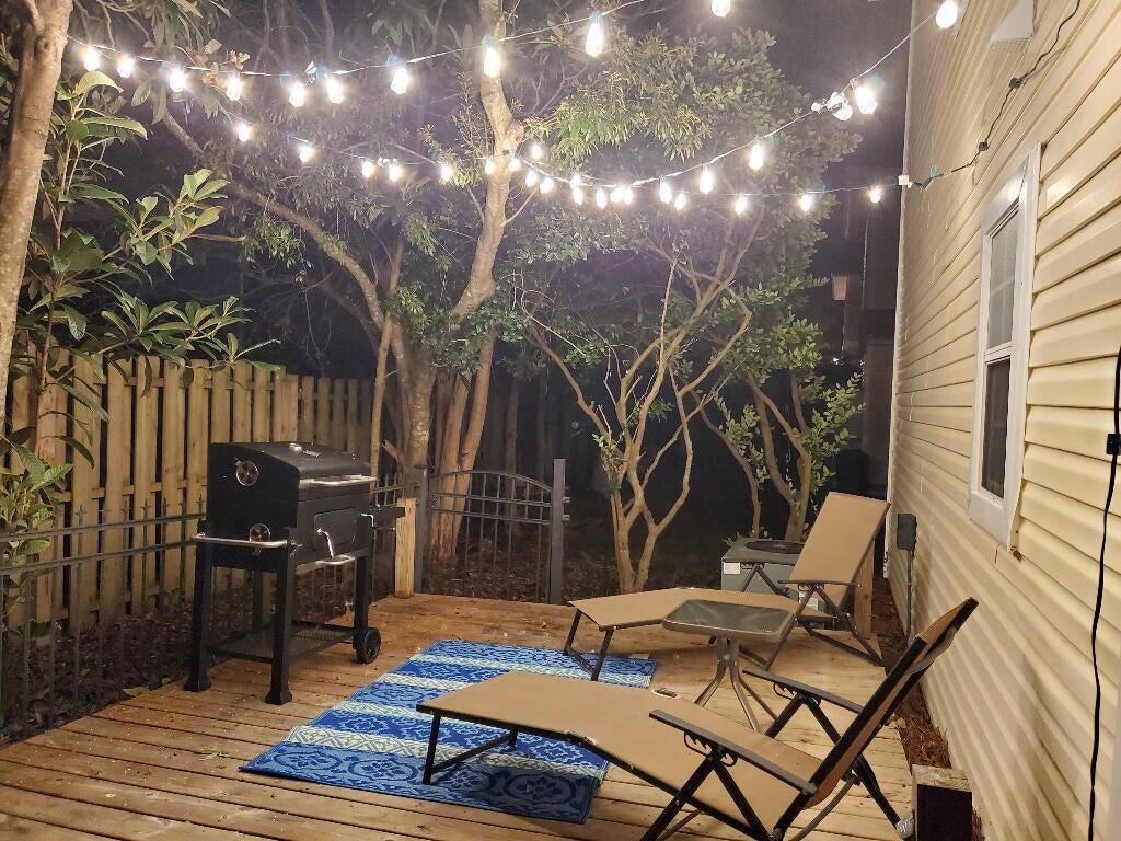 223 Redfish Circle Santa Rosa Beach, FL 32459 - Photo 20 of 26 a backyard view of a house with seating space