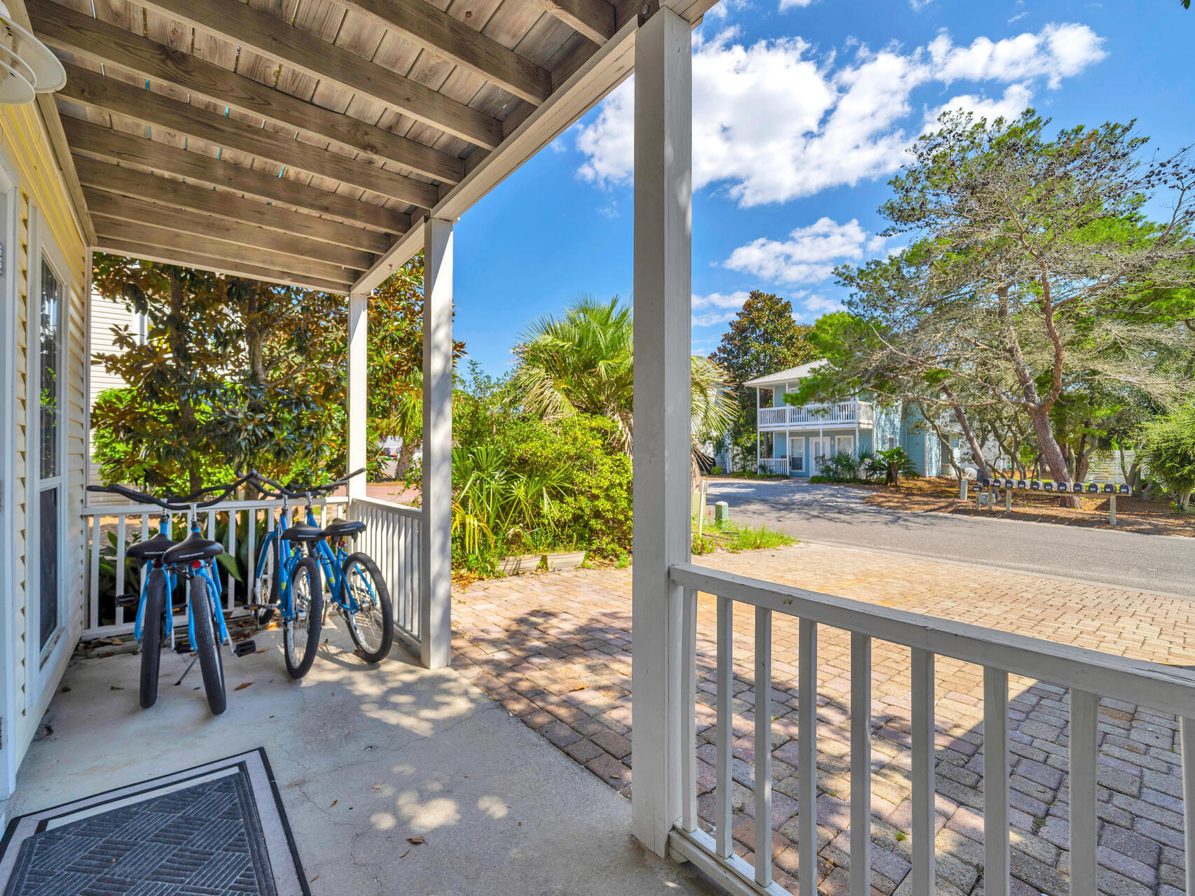 223 Redfish Circle Santa Rosa Beach, FL 32459 - Photo 23 of 26 a view of a porch with a table and chairs
