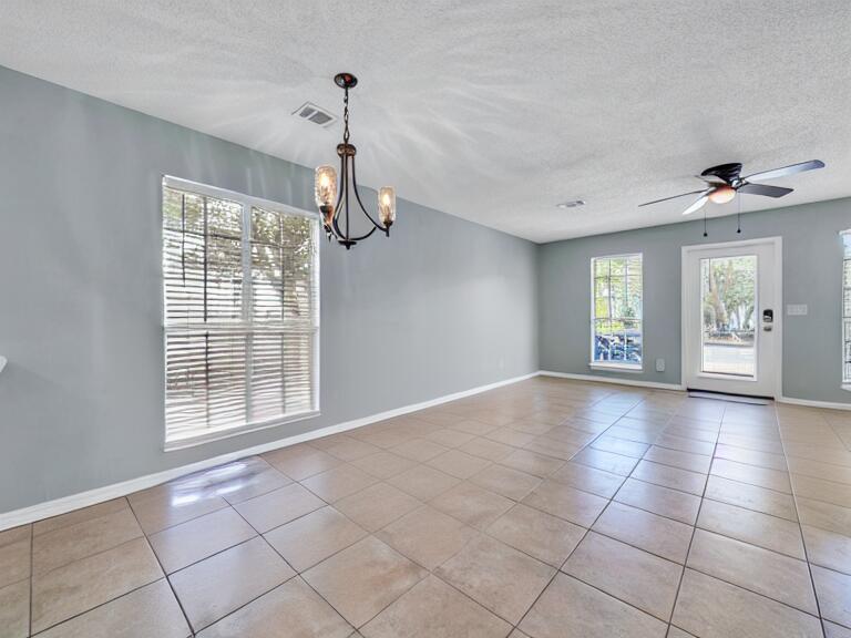223 Redfish Circle Santa Rosa Beach, FL 32459 - Photo 7 of 26 a view of an empty room with a window