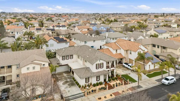 an aerial view of residential building with outdoor space