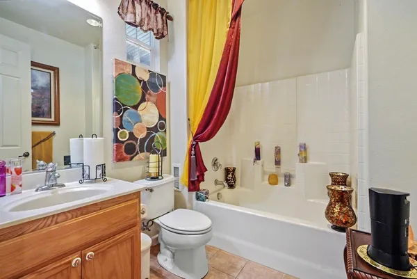 a bathroom with a sink a toilet and a bathtub