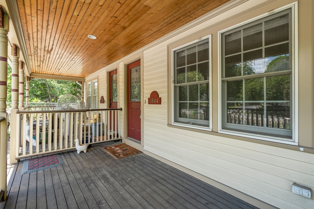1844 Main Street, Unit 1 Concord, MA 01742 - Photo 34 of 36 a front view of a house with a large window