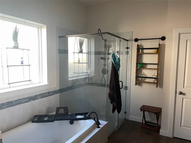 a bathroom with a sink and a window