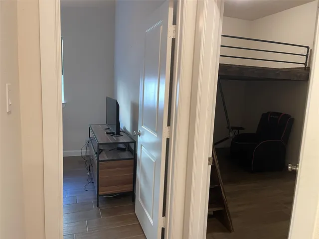 a bathroom with a toilet a sink and shower