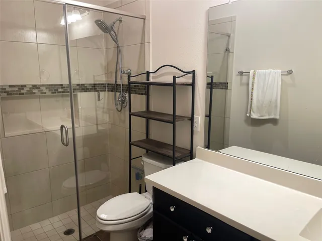 a room with furniture and wooden floor