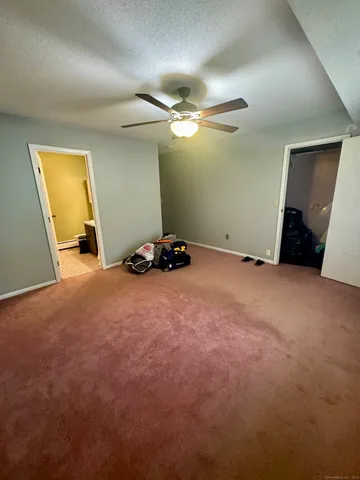 a view of room with gym equipment