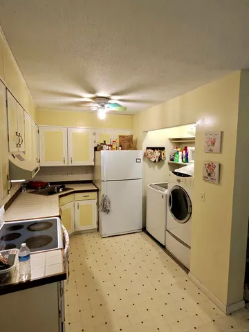 a storage room with washer and dryer