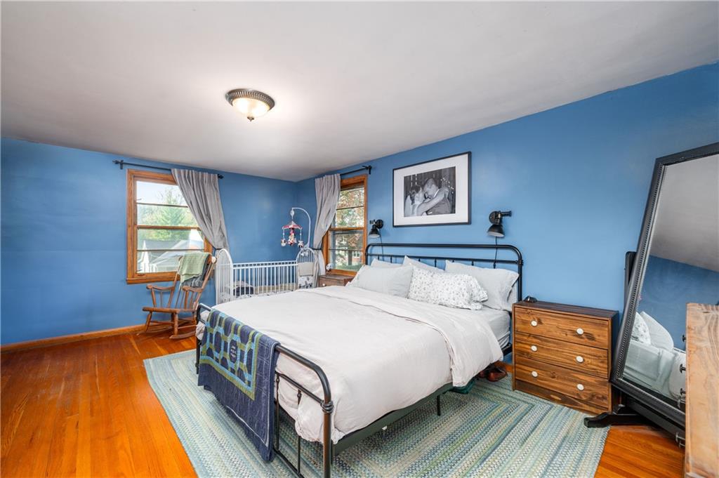 4121 Loring Street Butler, PA 16001 - Photo 15 of 37 a bed sitting in a bedroom next to a window