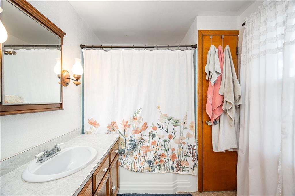 4121 Loring Street Butler, PA 16001 - Photo 21 of 37 a bathroom with a sink and a mirror