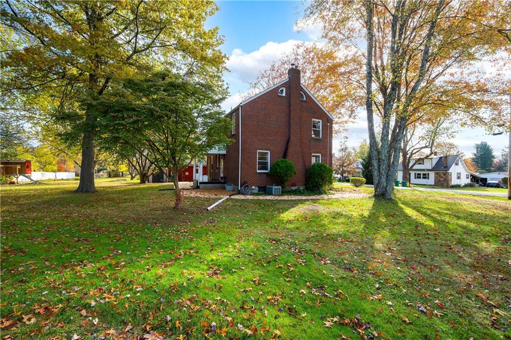 4121 Loring Street Butler, PA 16001 - Photo 28 of 37 a view of a yard with plants and trees