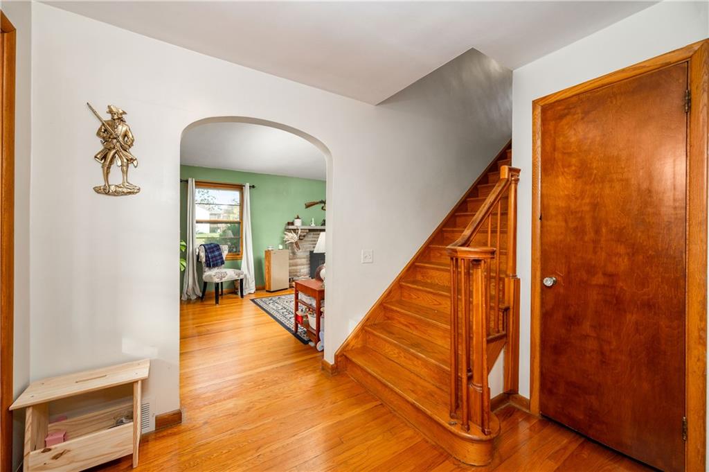 4121 Loring Street Butler, PA 16001 - Photo 4 of 37 a view of an entryway with wooden floor and stairs