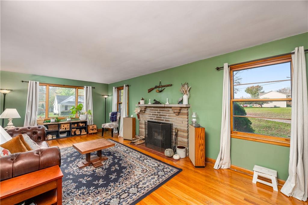 4121 Loring Street Butler, PA 16001 - Photo 6 of 37 a living room with furniture and a fireplace