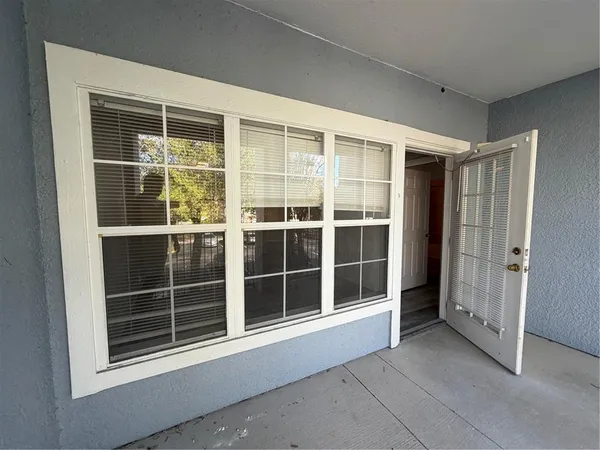 a view of empty room with windows