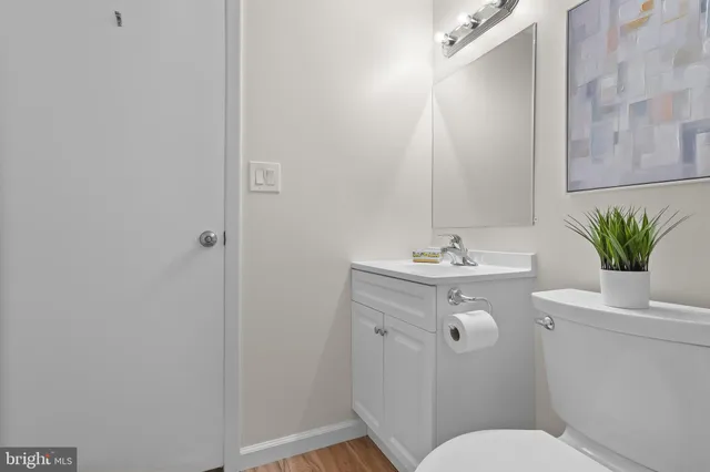 a bathroom with a sink toilet and bathtub