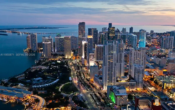 a view of a city with tall buildings