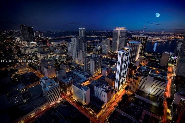 151 Southeast 1st Street, Unit 3010 Miami, FL 33131 - Photo 19 of 22 a view of a room with gym equipment