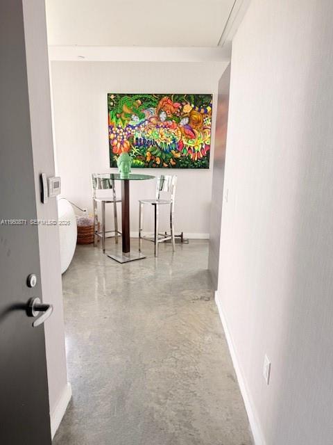 151 Southeast 1st Street, Unit 3010 Miami, FL 33131 - Photo 2 of 22 a view of a living room and dining room