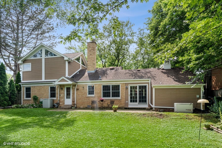 323 Wagner Road Northfield, IL 60093 - Photo 2 of 18 front view of a house and a yard