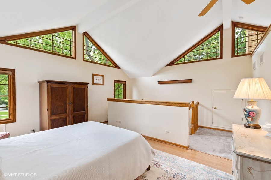 323 Wagner Road Northfield, IL 60093 - Photo 14 of 18 a bedroom with a bed and a window