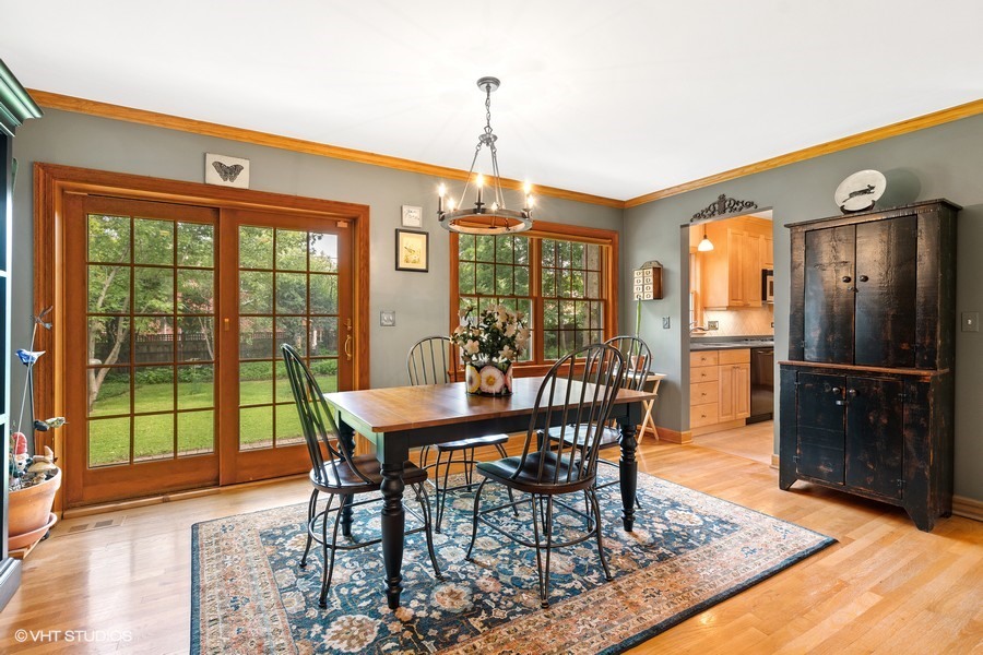 323 Wagner Road Northfield, IL 60093 - Photo 5 of 18 a view of a dining room with furniture window and outside view