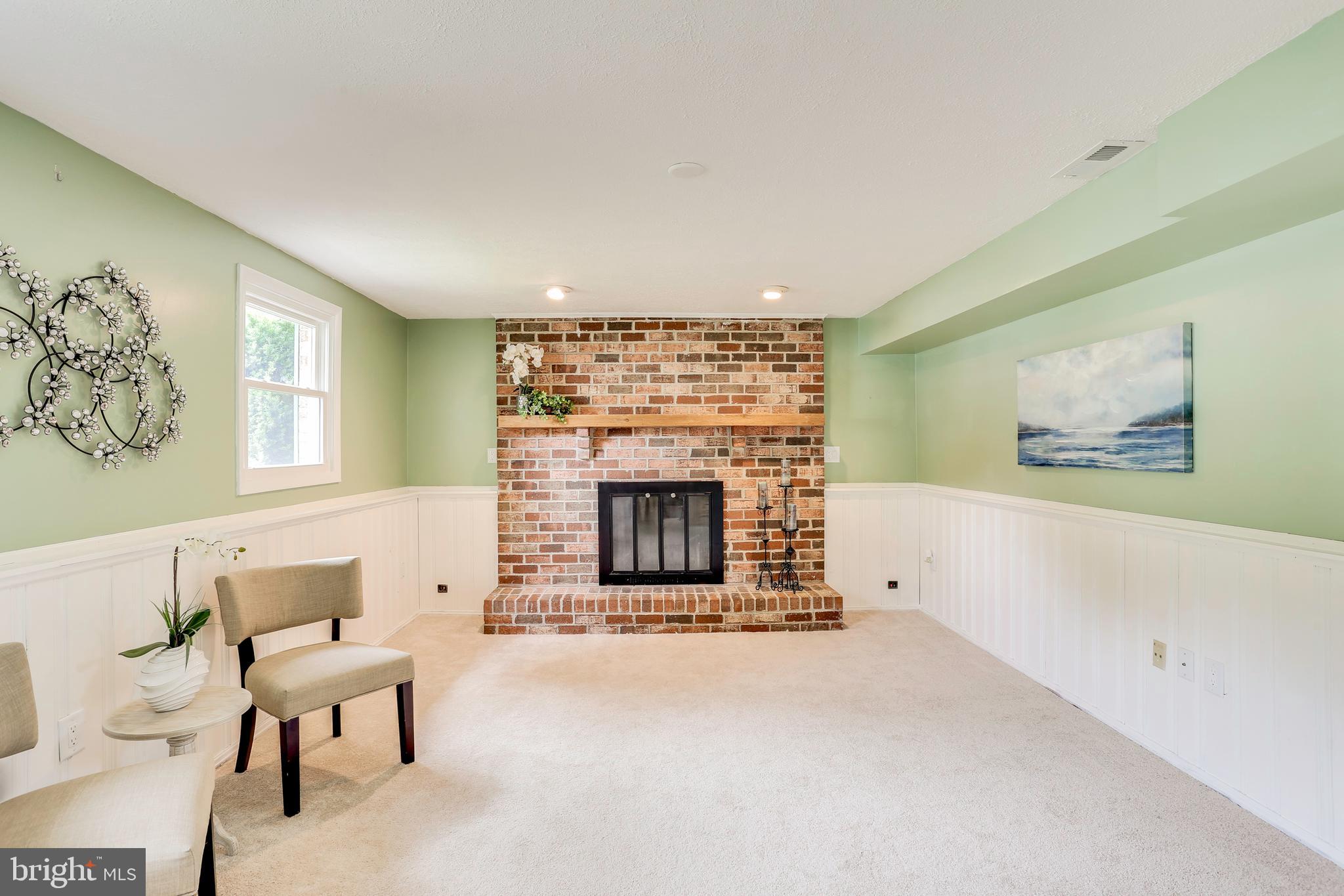 9398 Northgate Road Laurel, MD 20723 - Photo 22 of 27 Family Room with Cozy Fireplace