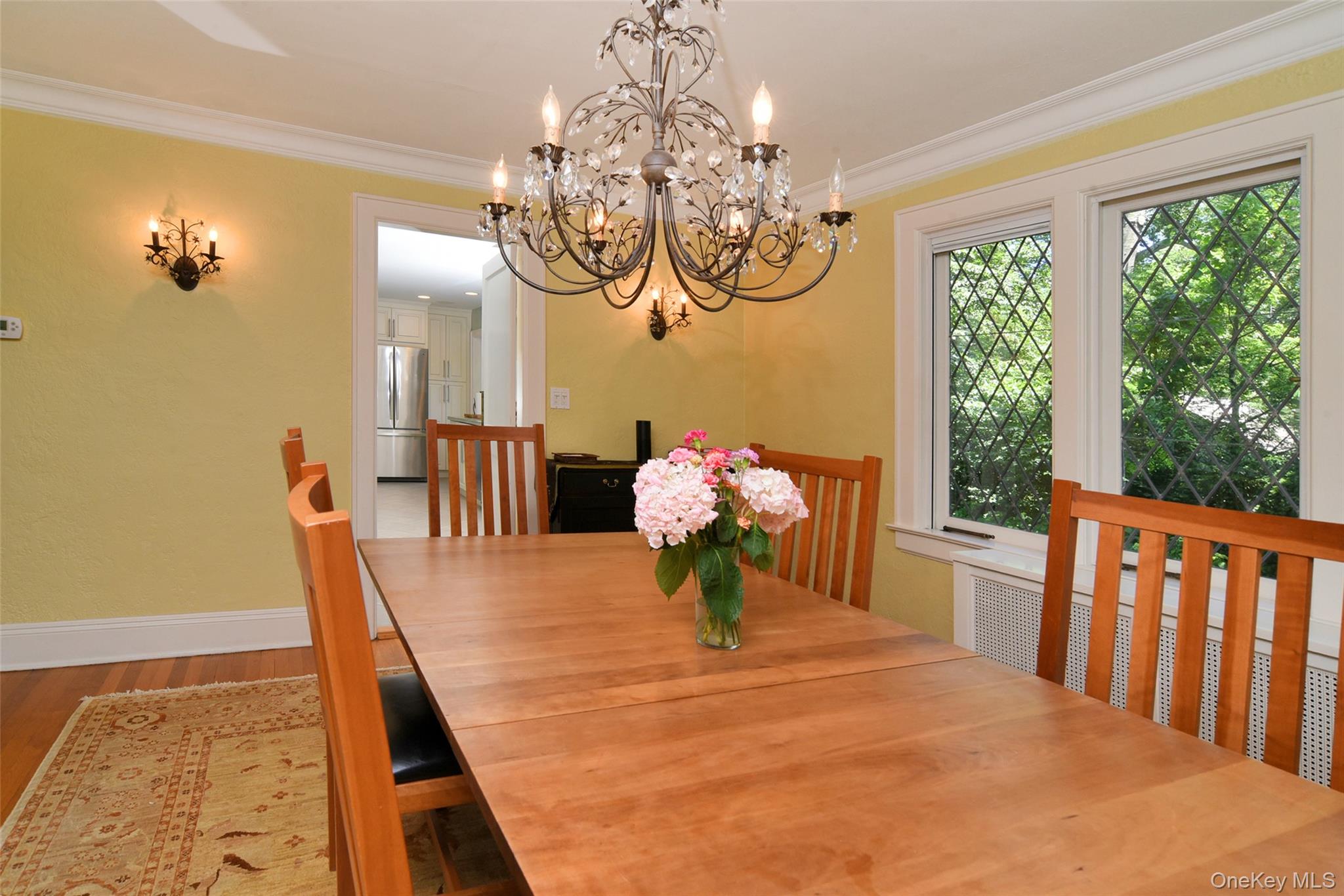 12 Barclay Road Scarsdale, NY 10583 - Photo 12 of 32 Dining room with kitchen beyond