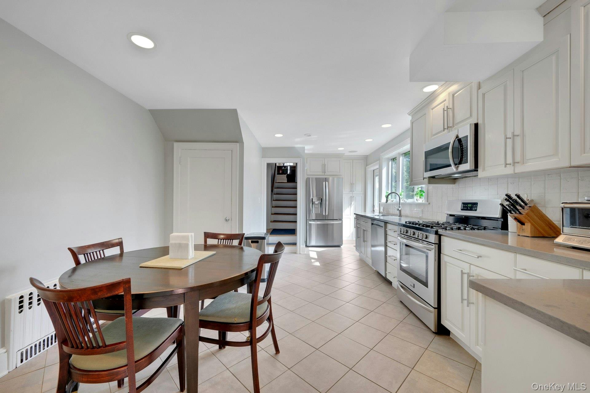 12 Barclay Road Scarsdale, NY 10583 - Photo 13 of 32 Lovely renovated kitchen, door to finished lower level on left