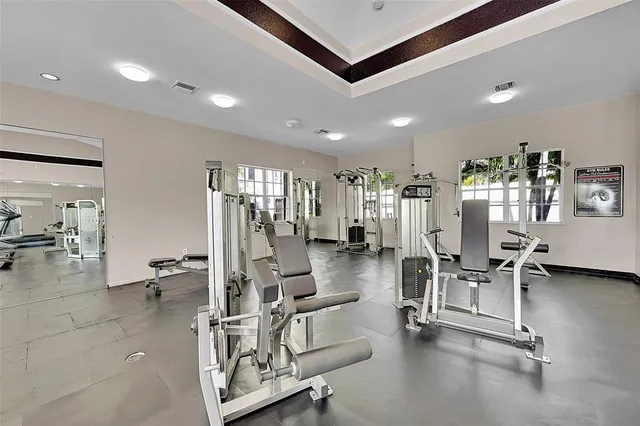 a view of a backyard with swimming pool