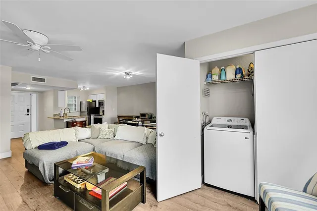 a living room with furniture and a table