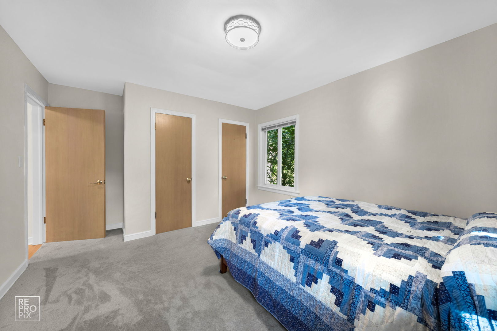 6872 North Loron Avenue Chicago, IL 60646 - Photo 21 of 25 a bedroom with a bed and a window