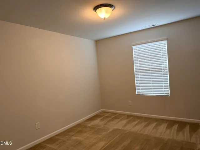 a view of storage and utility room with washer and dryer