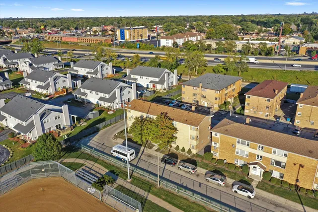an aerial view of a city with houses