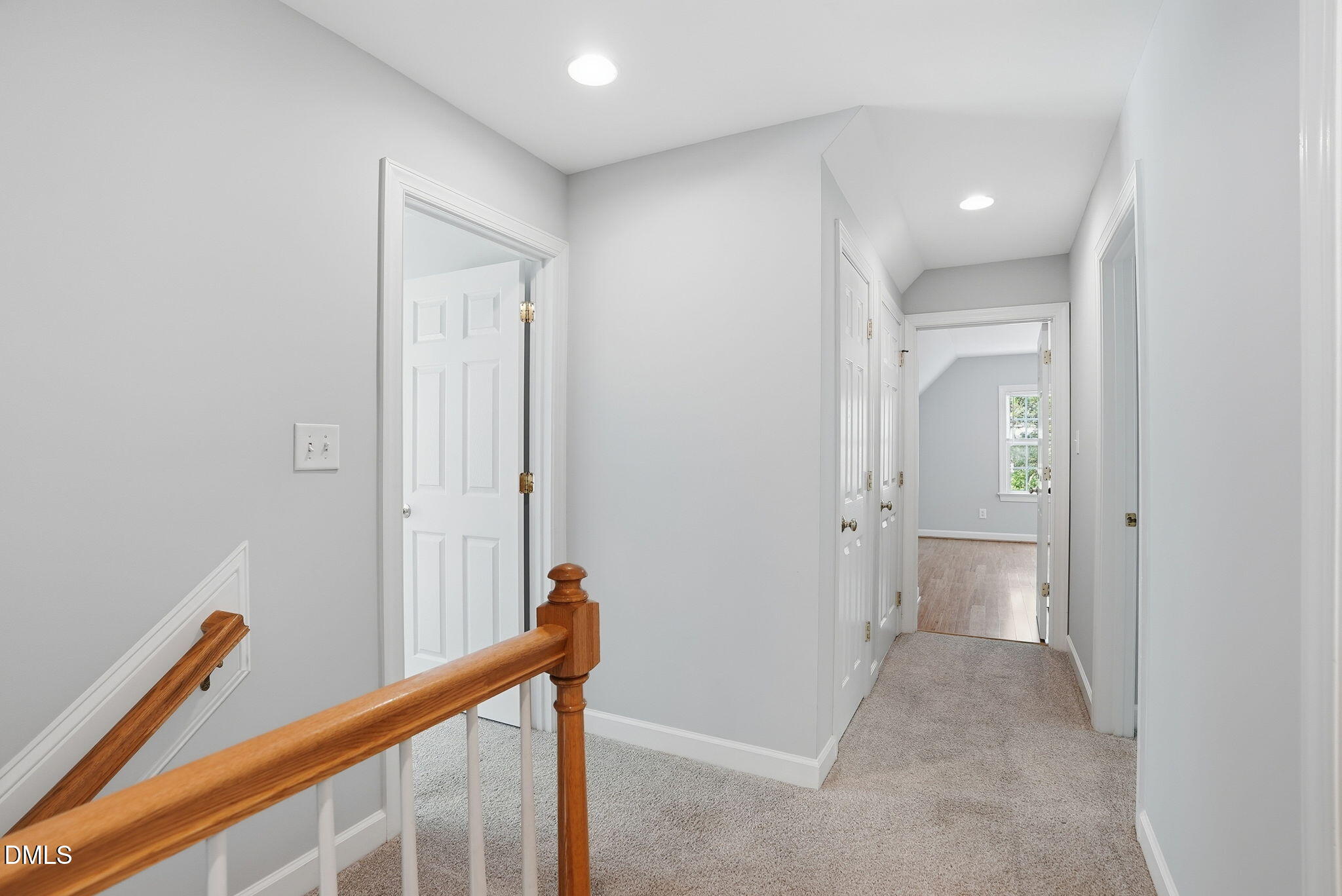 7 Morgans Ridge Lane Durham, NC 27707 - Photo 35 of 75 a view of a hallway with a door