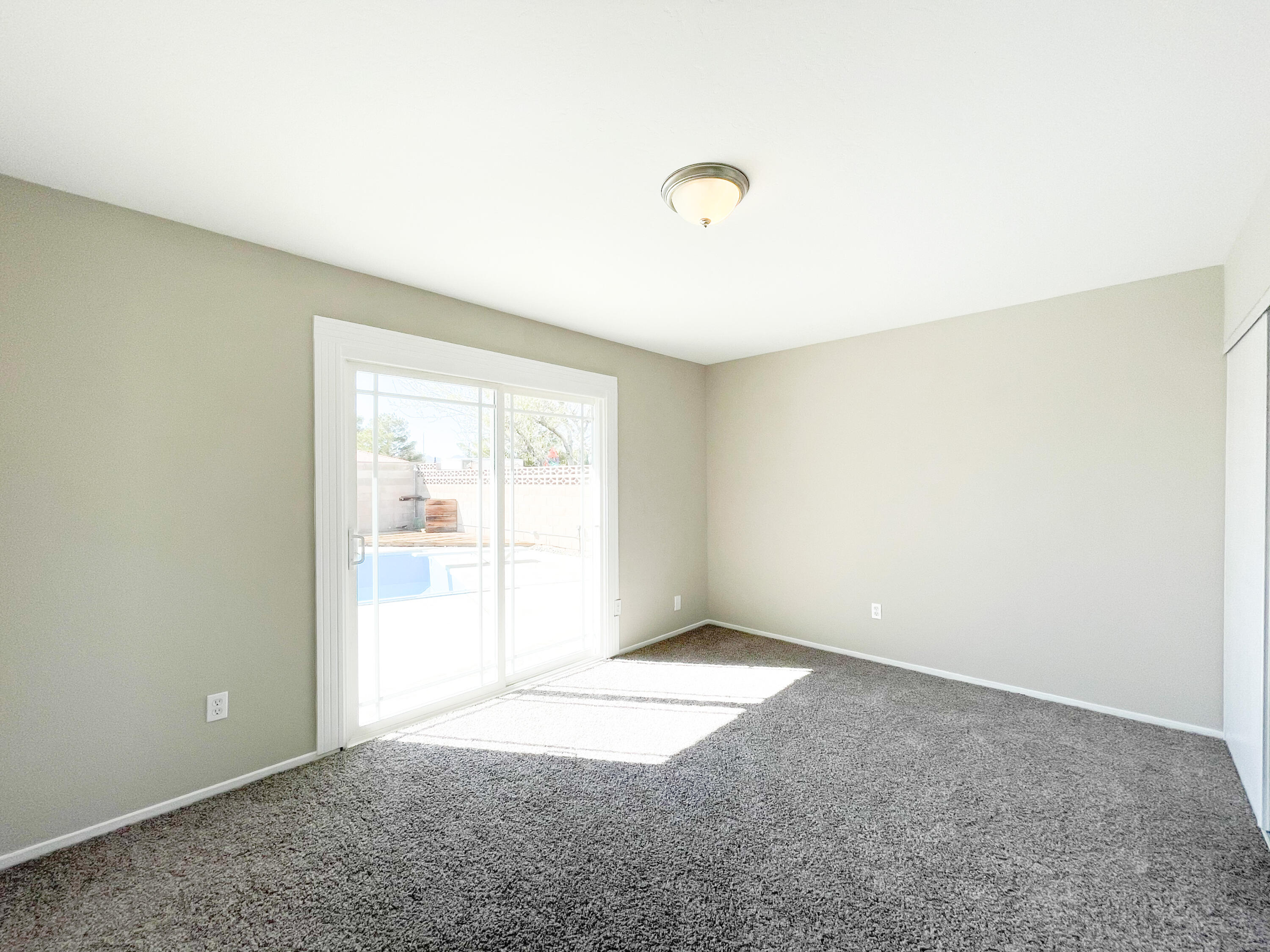 429 Peg Street Ridgecrest, CA 93555 - Photo 12 of 20 an empty room with a empty space and a window