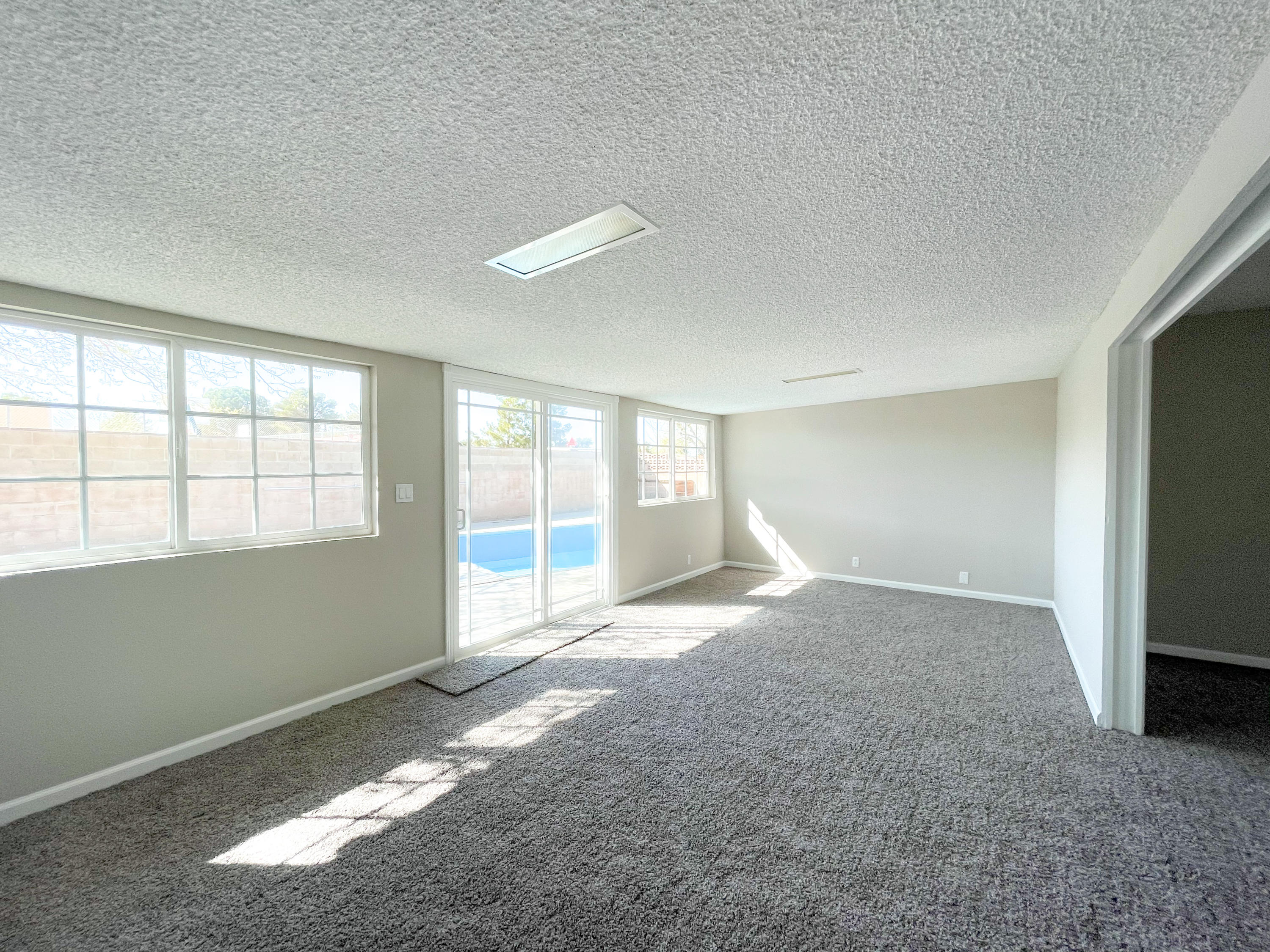 429 Peg Street Ridgecrest, CA 93555 - Photo 14 of 20 a view of an empty room with a window