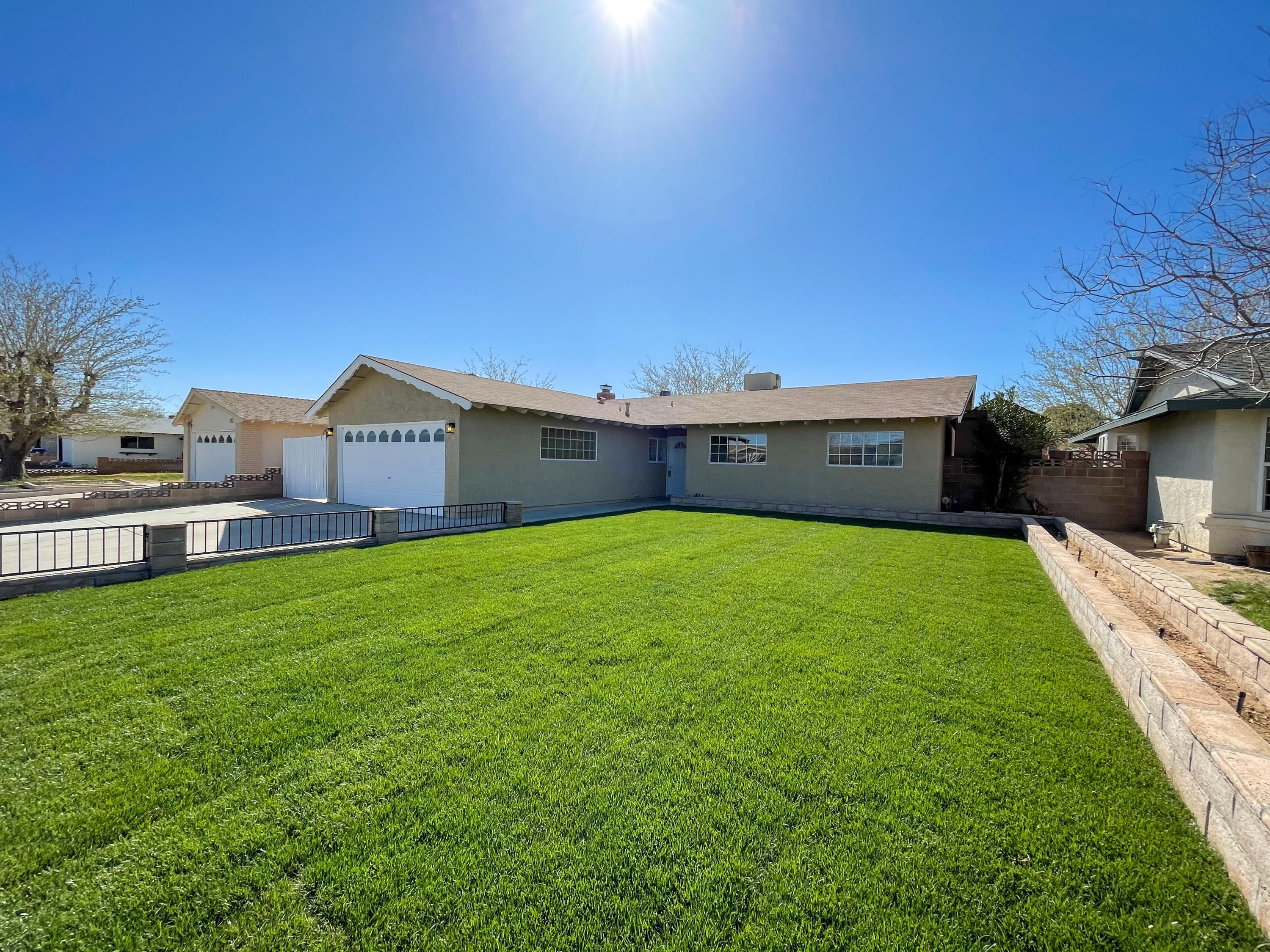 429 Peg Street Ridgecrest, CA 93555 - Photo 2 of 20 a view of a house with a big yard