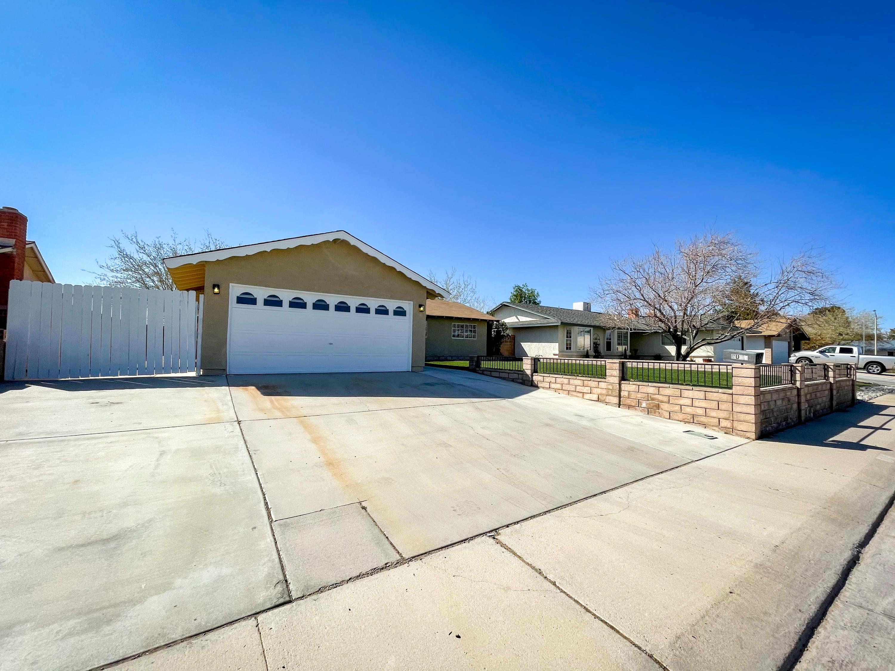 429 Peg Street Ridgecrest, CA 93555 - Photo 4 of 20 a view of a parking space in front of a building