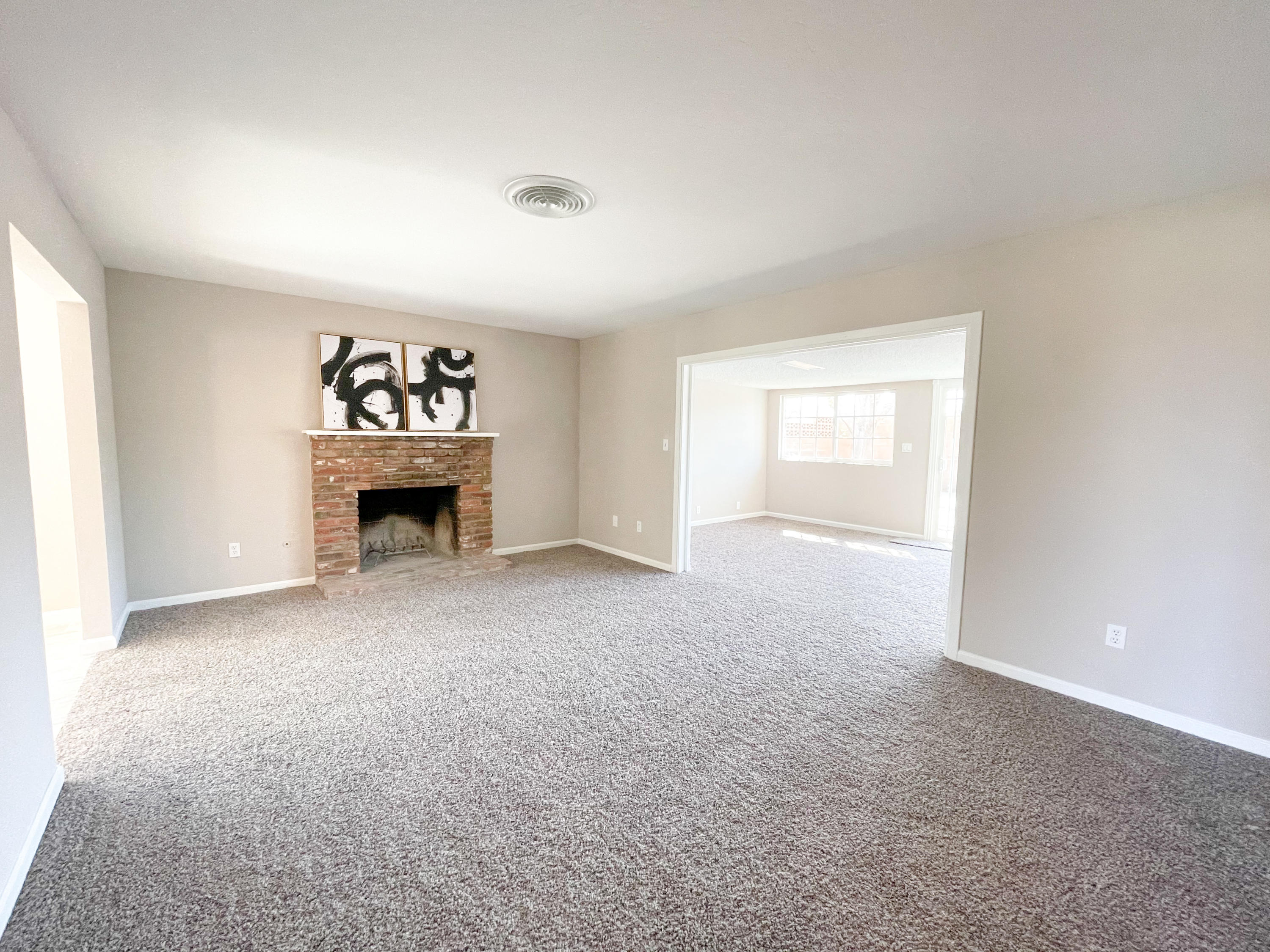 429 Peg Street Ridgecrest, CA 93555 - Photo 5 of 20 a view of empty room with a fireplace