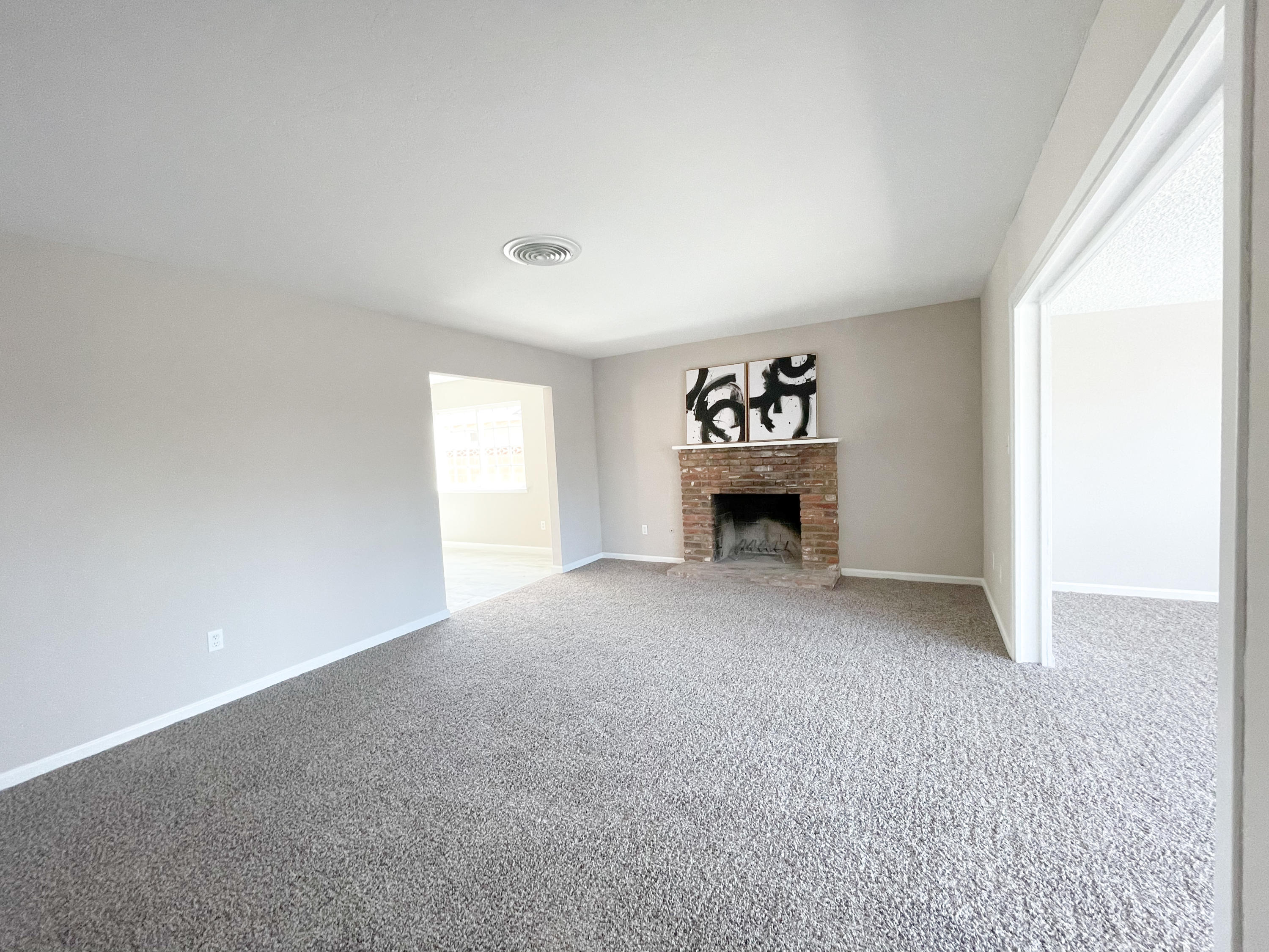 429 Peg Street Ridgecrest, CA 93555 - Photo 6 of 20 a view of an empty room with a window