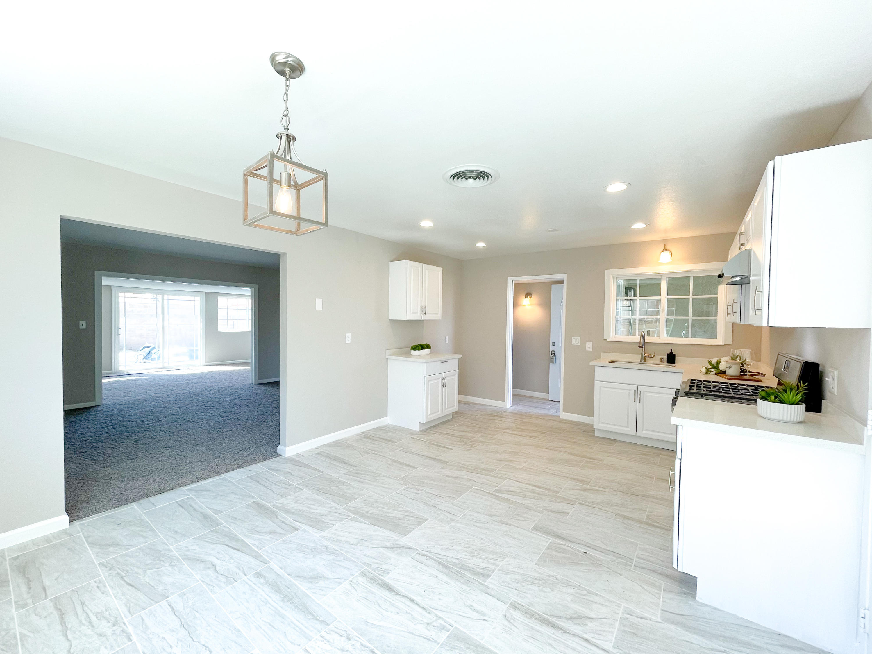 429 Peg Street Ridgecrest, CA 93555 - Photo 8 of 20 a view of a kitchen with a sink stainless steel appliances and cabinets