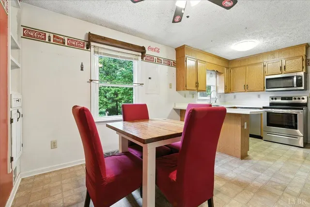 a view of a dining room with furniture